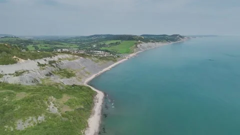 Cliffs over  Jurassic Coast from a drone, Jurassic Coast, Lyme Regis, Dorset, UK Stock Footage 250411116