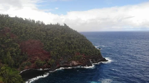 Cliffs by the Red Sand Beach along the Road to Hana in Maui, Hawaii Stock Footage 112727501