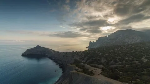 Cliffs by the sea at sunset Stock Footage 307766348