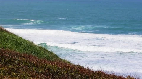 Cliffs, sea, waves, sun, wind, green rocks Stock Footage 237889983