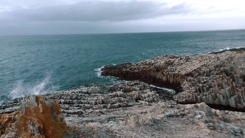 Cliffs on the shore of the ocean  Stock Footage 84006159