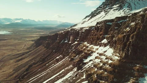 Cliffs with snow in Iceland Stock Footage 154817796