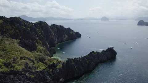 Cliffs stretching into the sea on tropical islands Stock Footage 273073182