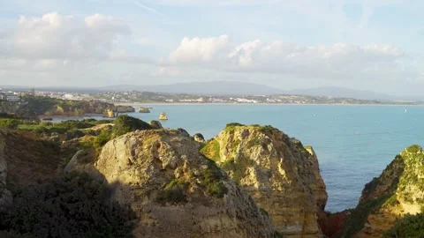Cliffs with stunning ocean view and rock formations in Portugal bay of Lagos Stock Footage 273673362