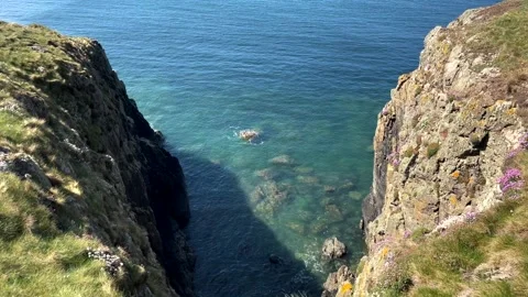 Cliffs in the summertime on the Isle of Anglesea in Wales Stock-Footage 154318989
