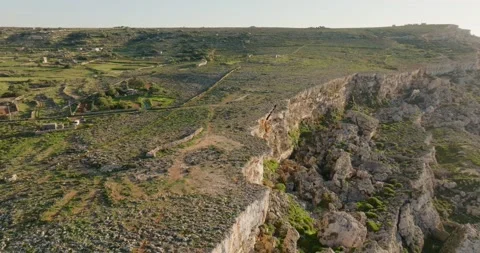 Cliffs on sunset, aerial view. Malta Stock Footage 232250926
