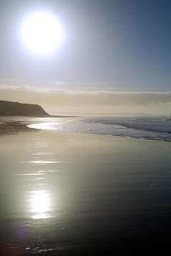 Cliffs on a sunset beach Foto stock