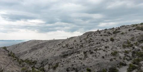 Cliffs surrounding the Pustinja Blaca, deserted remote area on the island of  Stock Photos