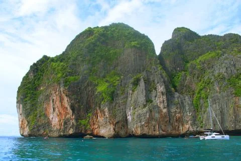 Cliffs on the tropical coast of Phi Phi islands, Thailand. Photos