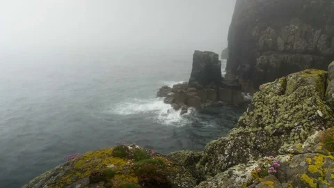 Cliffs under Neist Point Lighthouse, Isle of Skye, Scotland. Stock Footage 76760119