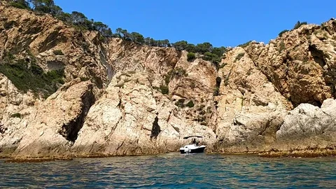 Cliffs view from the sea in Tossa de Mar, Spain Stock Footage 129552881