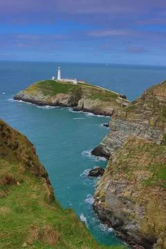 Cliffs in Wales with Lighthouse Stock Photos