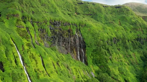 Cliffs with waterfalls of Poco Ribeira do Ferreiro, Flores Island, Azores Video stock 153253647