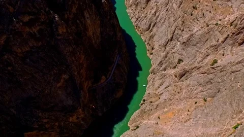 Cliffside Base Jump Over Scenic Canyon River Stock Footage 309483632