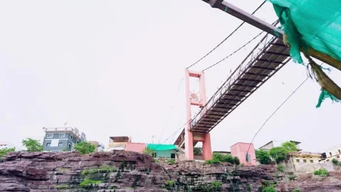 Cliffside Buildings Meet Rope Bound Overpass Stock Footage 314178174