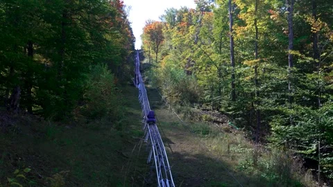 Cliffside Coaster ascending Mount Von Hoevenberg in the Adirondacks in upstate Stock Footage 334948342