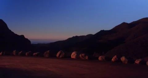 Cliffside landscape view of forest mountain sunset Stock Footage 136337309