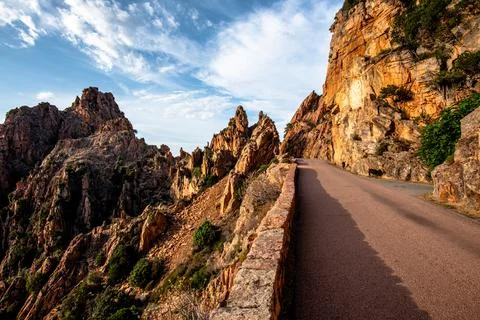 Cliffside Mountain Road Through Rock Formations Stock Photos