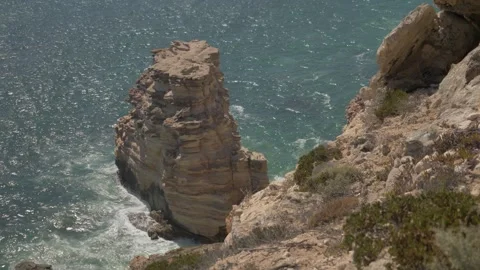 Cliffside Rock in the Ocean Stock Footage 315984645