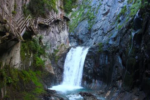 Cliffside steps near waterfall Stockfoto's