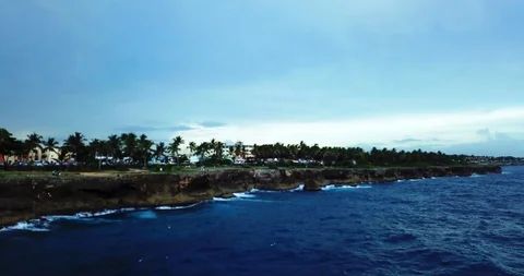 Cliffside Tracking Shot over water Stock Footage 97359904