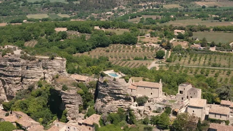 Clifftop pool overlooks endless vineyards in the hills of Provence Video stock 345067718