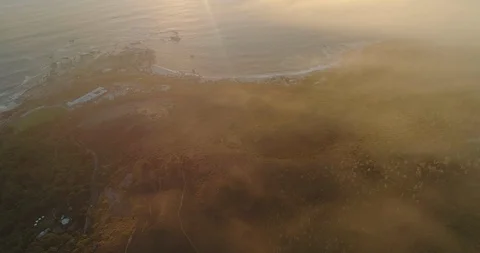 Clifton Aerial View Through Layer of Orange Clouds Stock Footage 92115314