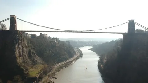 Clifton Suspension Bridge with a view down the Avon through the city of Bristol Stock Footage