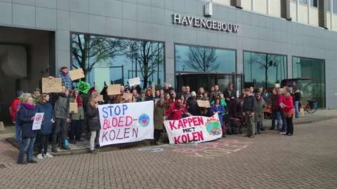 Climate activists in Amsterdam during protest against coal mining Stock Footage 239068093