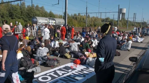 Climate activists blockade TotalEnergies train tracks Code Rouge Belgium 2022 Stock Footage 220217834