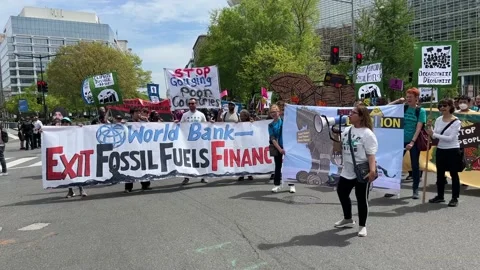 Climate activists protest outside IMF and World Bank headquarters Stock Footage 238542715