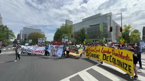 Climate activists protest outside IMF and World Bank headquarters Stock Footage 238542718