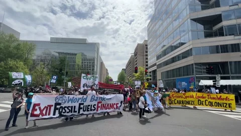 Climate activists protest outside IMF and World Bank headquarters Stock Footage 238542721