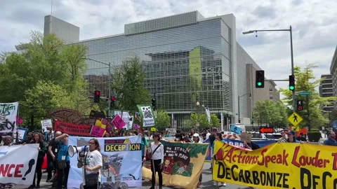 Climate activists protest outside IMF and World Bank headquarters Stock Footage 238542723