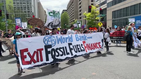 Climate activists protest outside IMF and World Bank headquarters Stock Footage 238542727