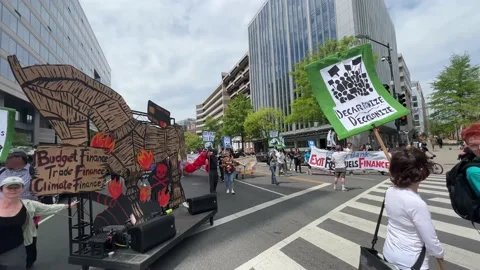 Climate activists protest outside IMF and World Bank headquarters Stock Footage 238542729