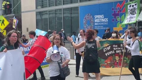 Climate activists protest outside IMF and World Bank headquarters Stock Footage 238542731