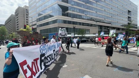 Climate activists protest outside IMF and World Bank headquarters Stock Footage 238542732