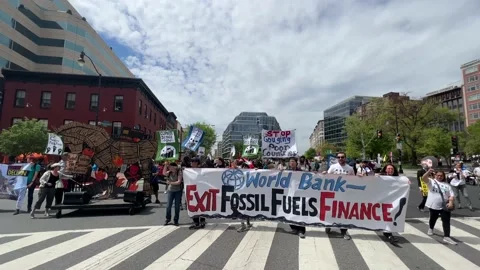 Climate activists protest outside IMF and World Bank headquarters Stock Footage 238542747