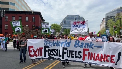 Climate activists protest outside IMF and World Bank headquarters Stock Footage 238542751