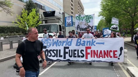 Climate activists protest outside IMF and World Bank headquarters Stock Footage 238542774