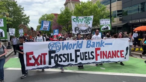 Climate activists protest outside IMF and World Bank headquarters Stock Footage 238542811