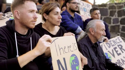 Climate change activist. People prepare banner for environmental protest Stock Footage 333601811
