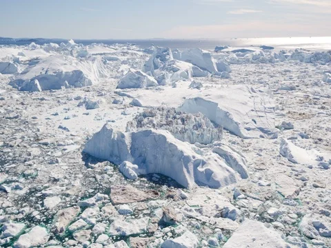 Climate Change and Global Warming - Icebergs from melting glacier in icefjord Video stock 80822652