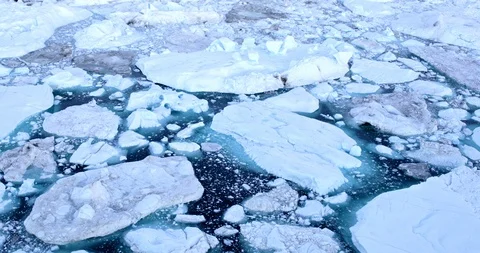 Climate Change and Global Warming - Icebergs from melting glacier in icefjord Stock Footage 88101986