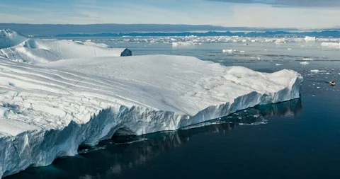 Climate Change and Global Warming - Icebergs from melting glacier on Greenland Stock Footage 101625955