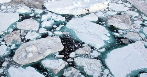 Climate Change and Global Warming - Icebergs from melting glacier in icefjord Stock Footage 112888285