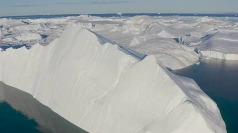 Climate Change and Global Warming. Icebergs from melting glacier Video stock 203237947