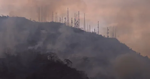 Climate Change Apocalyptic Wildfire on Hill with Communication Antennas. Stock Footage 241018265