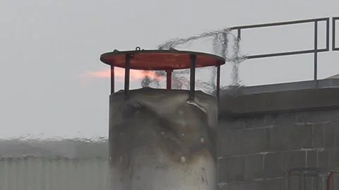 Climate change , carbon emissions flames and gasses from industrial smokestack Видео 151238436